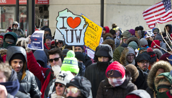 Protesters attend the The "Stop the Cuts-Save the University of Wisconsin" rally in Madison, Wis. on Feb. 14, 2015. (AP Photo/Wisconsin State Journal- Steve Apps)