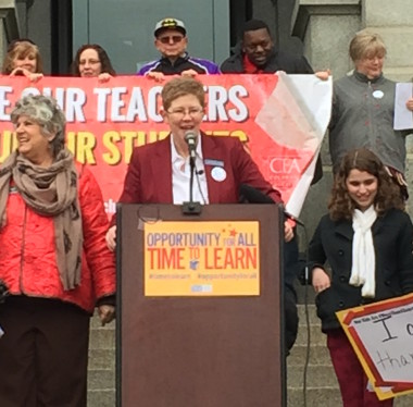 Colorado Education Association President Kerrie Dallman speaks up for more learning, less testing at a Denver rally on March 25.