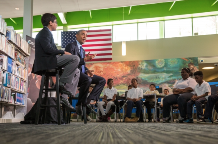 President Barack Obama answers questions from students during the Discovery Education webinar entitled "Read to Discover a World of Infinite Possibilities," at the Anacostia Neighborhood Library in Washington, D.C., April 30, 2015.