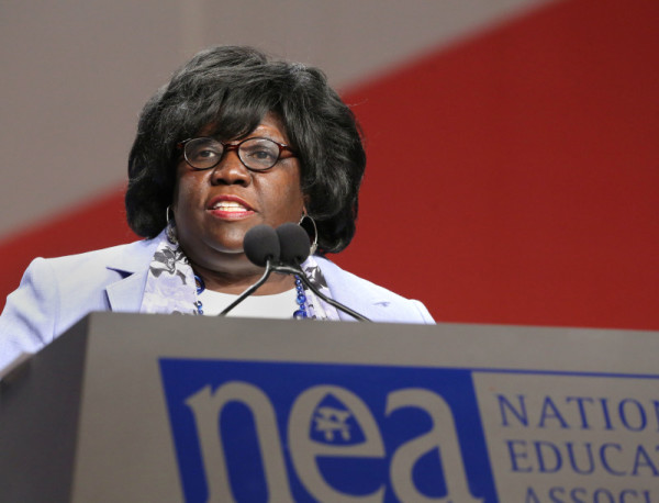 2015 Education Support Professional of the Year Janet Eberhardt speaks during the 94th NEA Representative Assembly at the Orange County Convention Center in Orlando, Florida, Saturday, July 4, 2015. Photo by Rick Runion