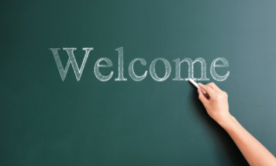 welcome written on blackboard