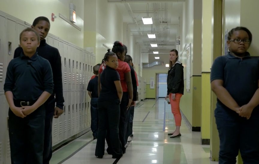 Students line up at a No Excuses charter school in Chicago. The No Excuses model has come under fire recently for its overly strict discipline regimen.