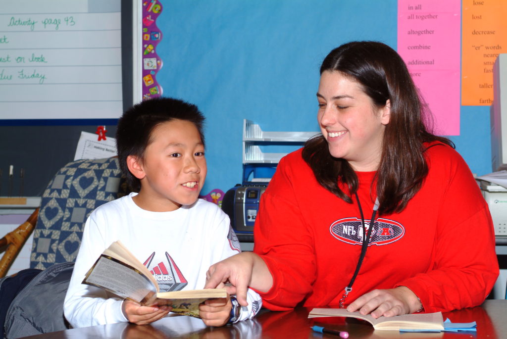 teacher with student