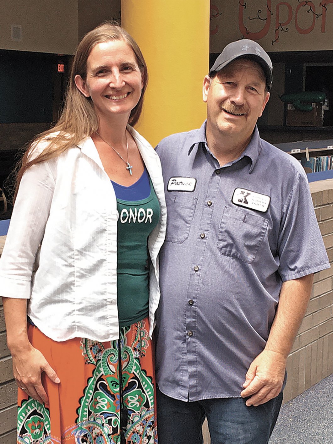Teacher Erin Durga and custodian Pat Mertens