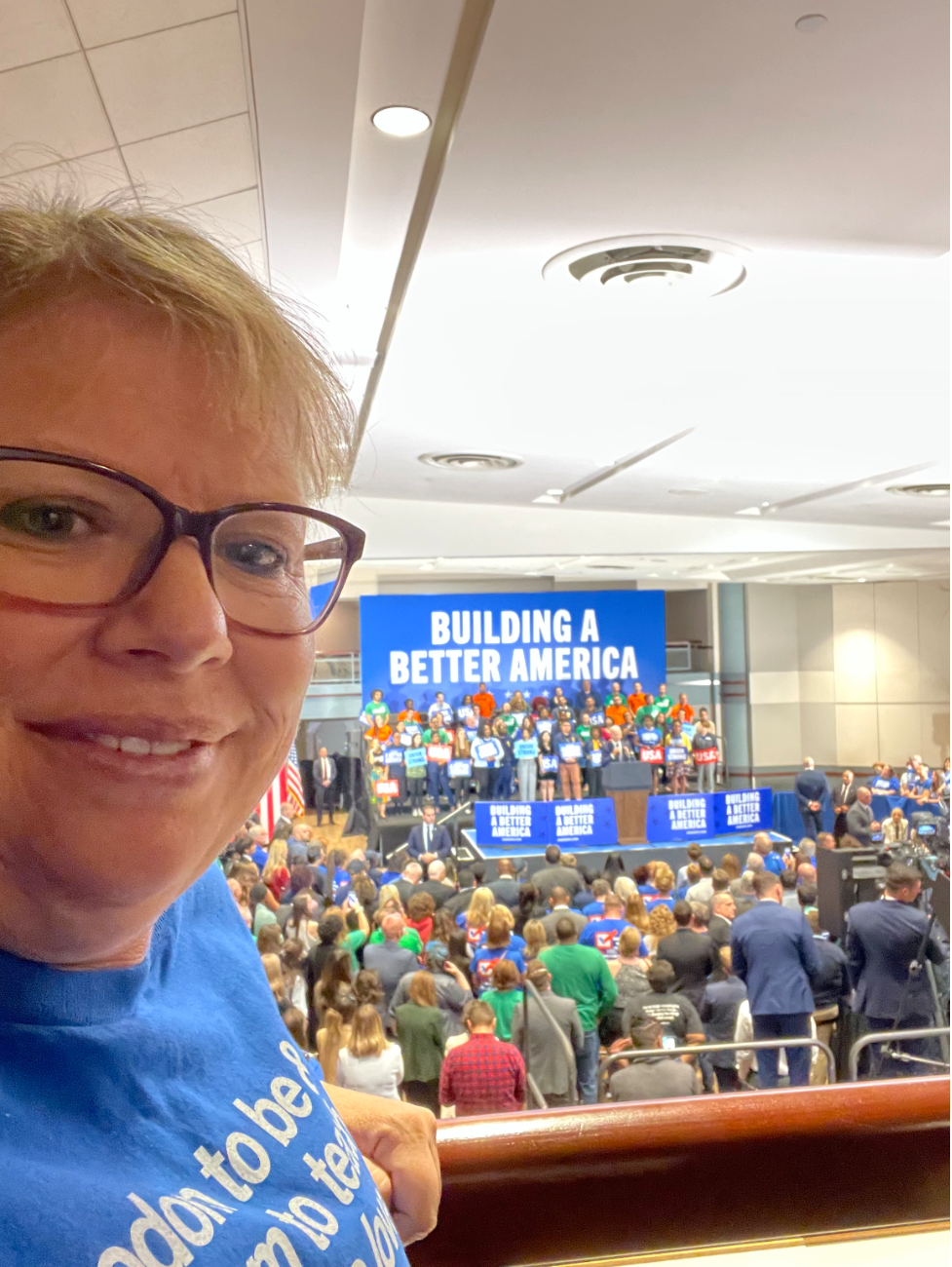 Dawn Etcheverry, a music teacher and Nevada State Education Association president, takes a selfie before Joe Biden speaks.