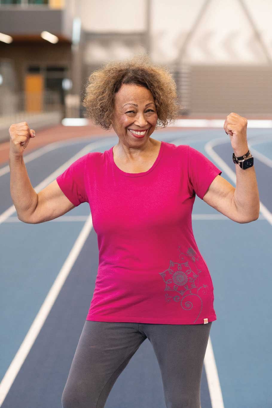 JoAnn Kenner flexing her muscles on the track.