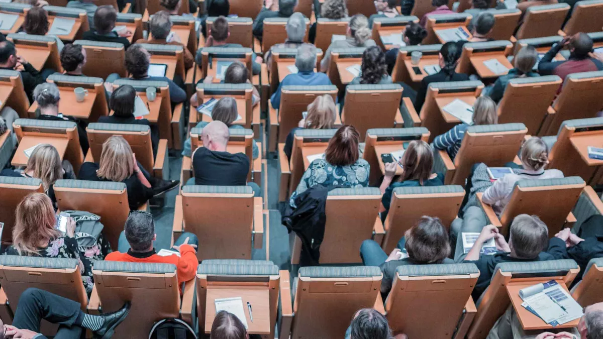 An overhead view of diverse students attending a lecture