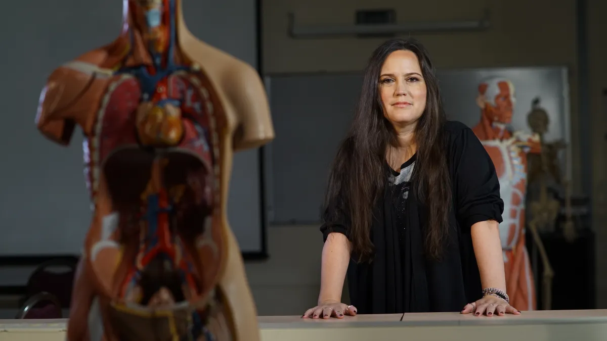 Photo of woman professor in STEM lab