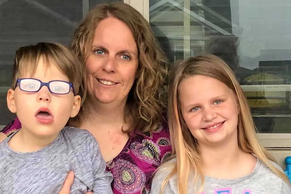 Iowa teacher Nancy Baker Curtis, and her two children, Charlie and Sophia.
