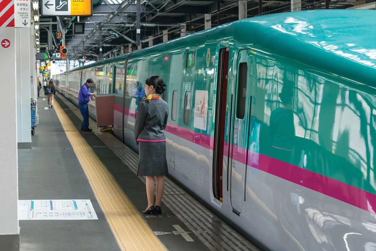 Hokkaido Shinkansen bullet train at a rail station
