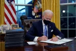 Biden at desk