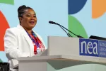 ESP of the Year Debra Ward-Mitchell speaks from the stage at the NEA Representative Assembly