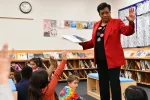 NEA President Becky Pringle reads to students at Gaithersburg Elementary School