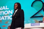 Disability rights activist Helena Donato-Sapp addresses the 2023 NEA RA