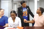 NEA President Becky Pringle shakes the hand of NEA Aspiring Educator K'Sean Dotch
