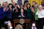 President Joe Biden signs the Social Security Fairness Act during a ceremony in the East Room of the White House, Sunday, Jan. 5, 2025, in Washington.