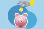 Coin dropping into a piggy bank.