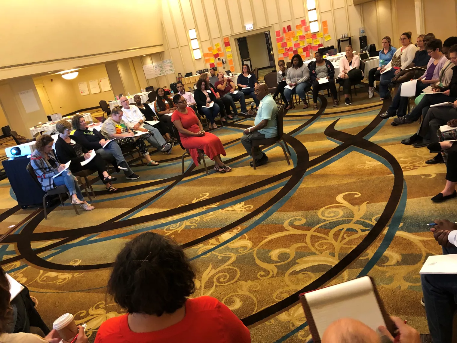 Two ECLL leads, Java Robinson and Tyrone Terry, model a coaching conversation.