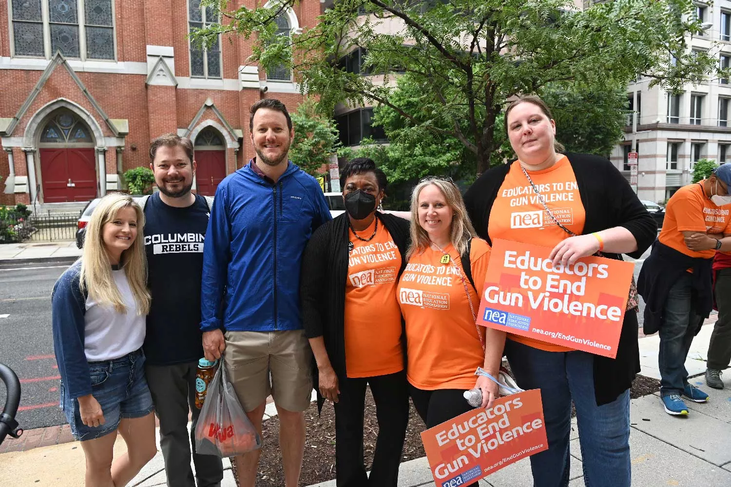 Educators at the March for Our Lives pose with Becky Pringle