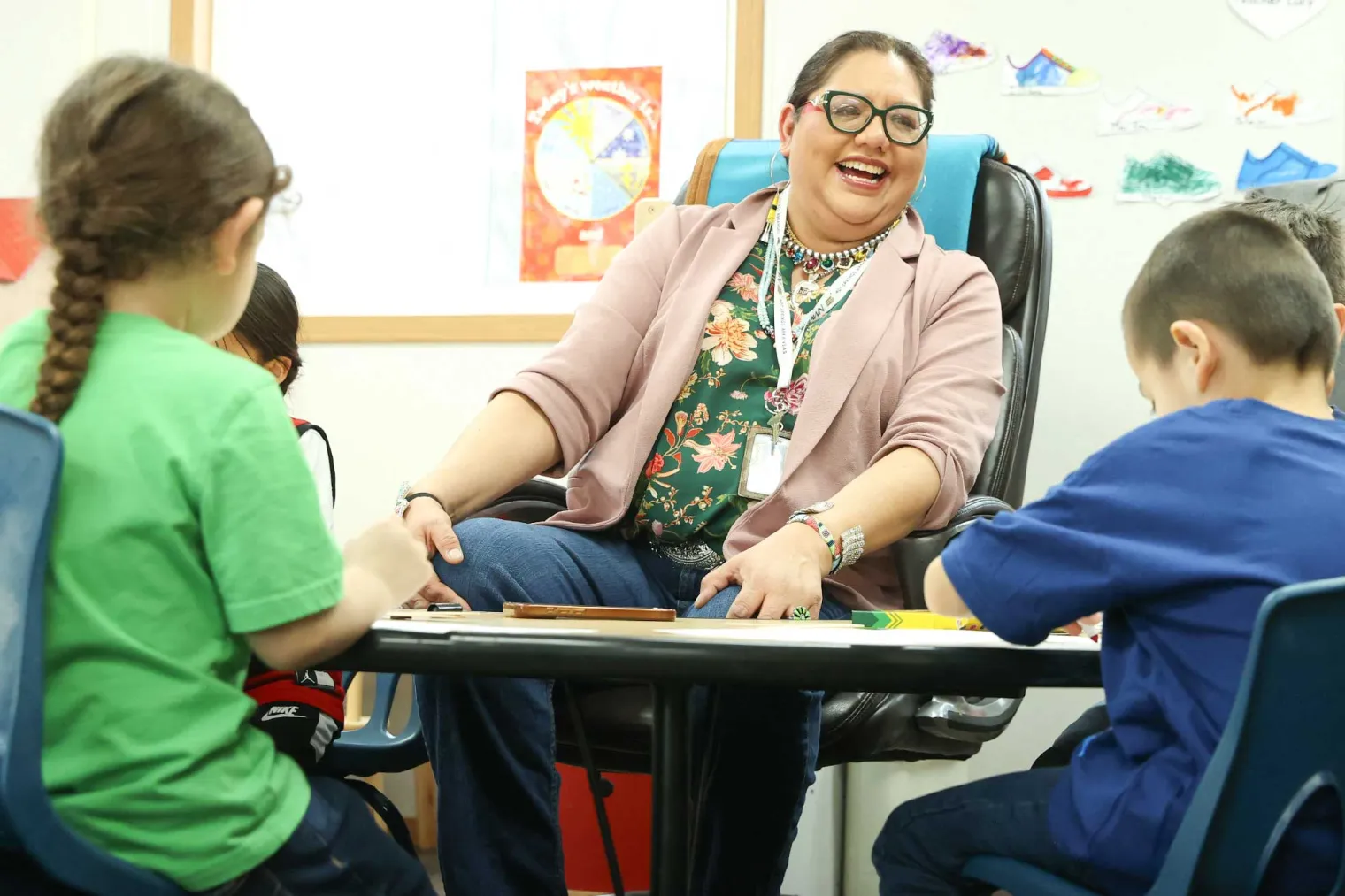 Lucy Real Bird enjoying a moment with her students.