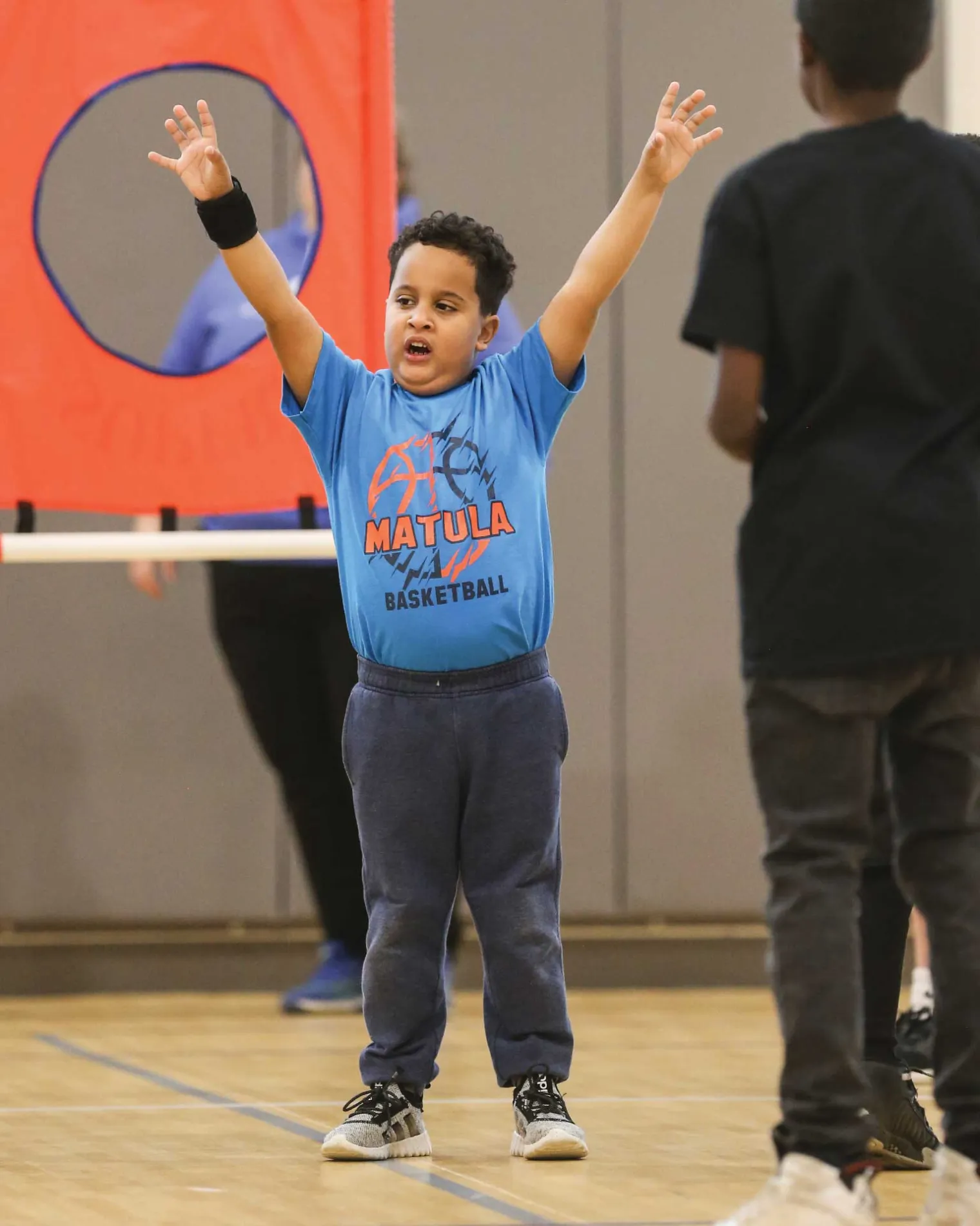 IDEA male student celebrating an accomplishment