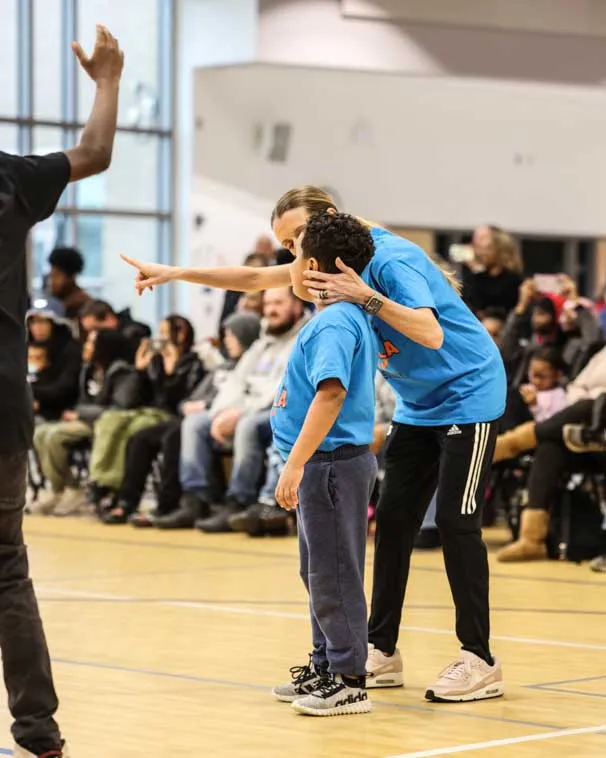 Teacher assisting an IDEA student.