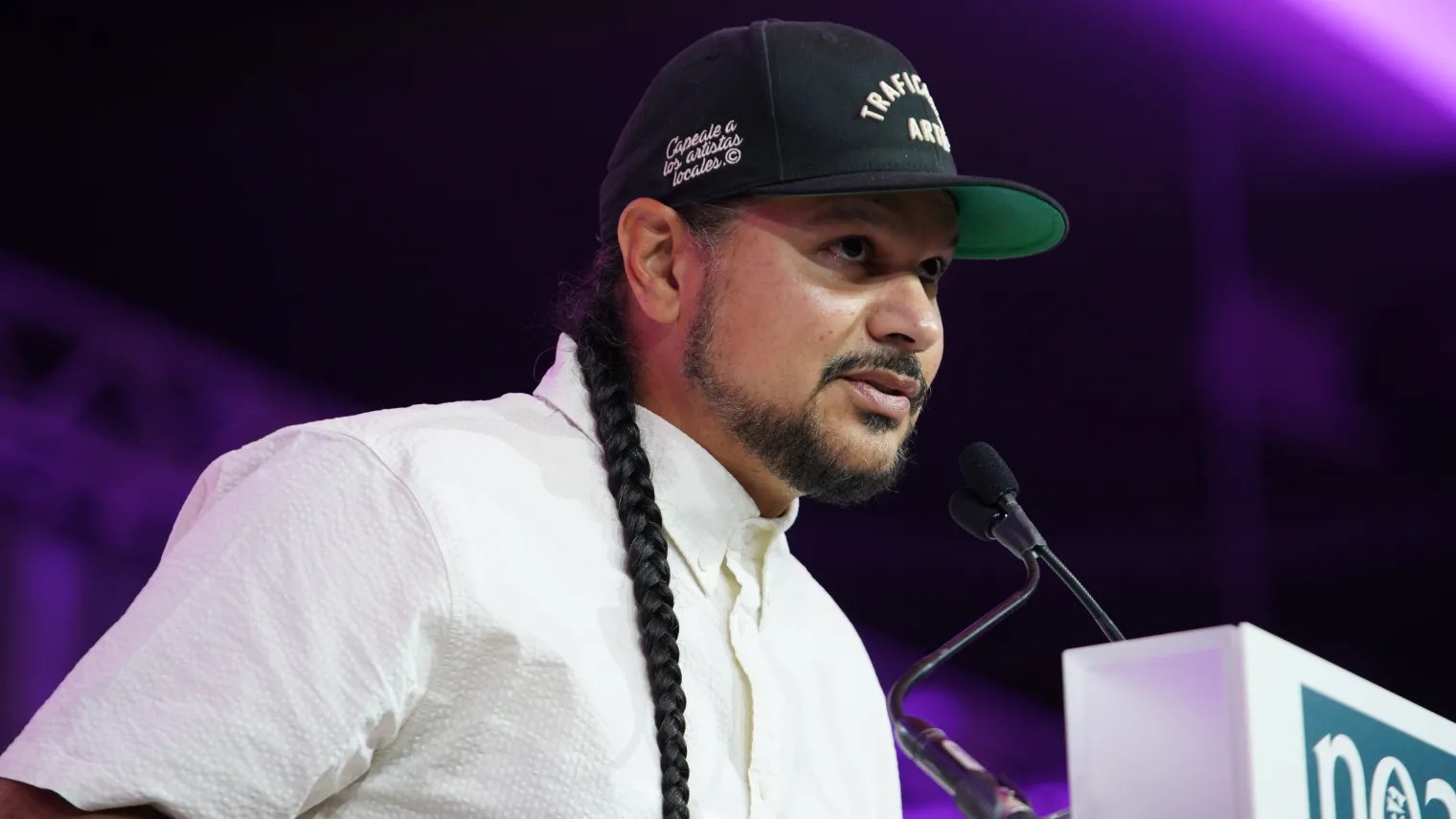 Man speaking at podium