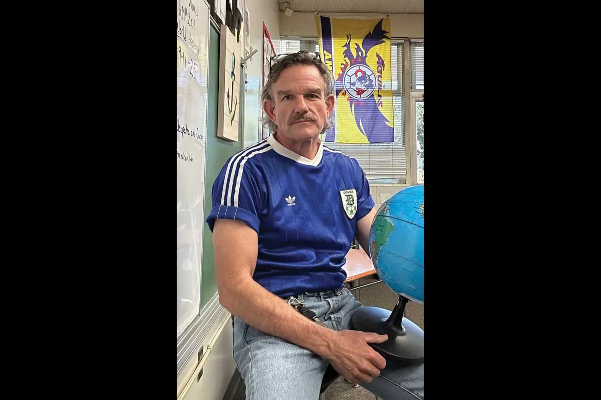 Mr. Ward in a blue Adidas shirt.