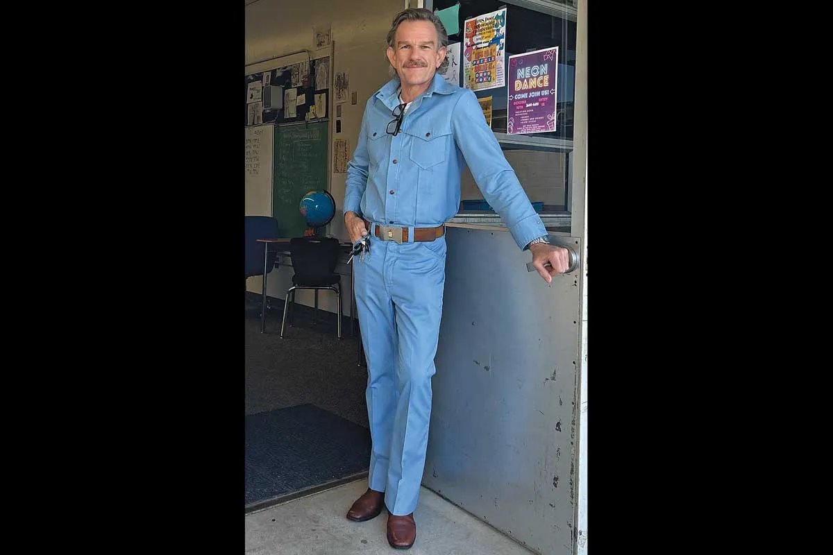 Mr. Ward in a light blue outfit.