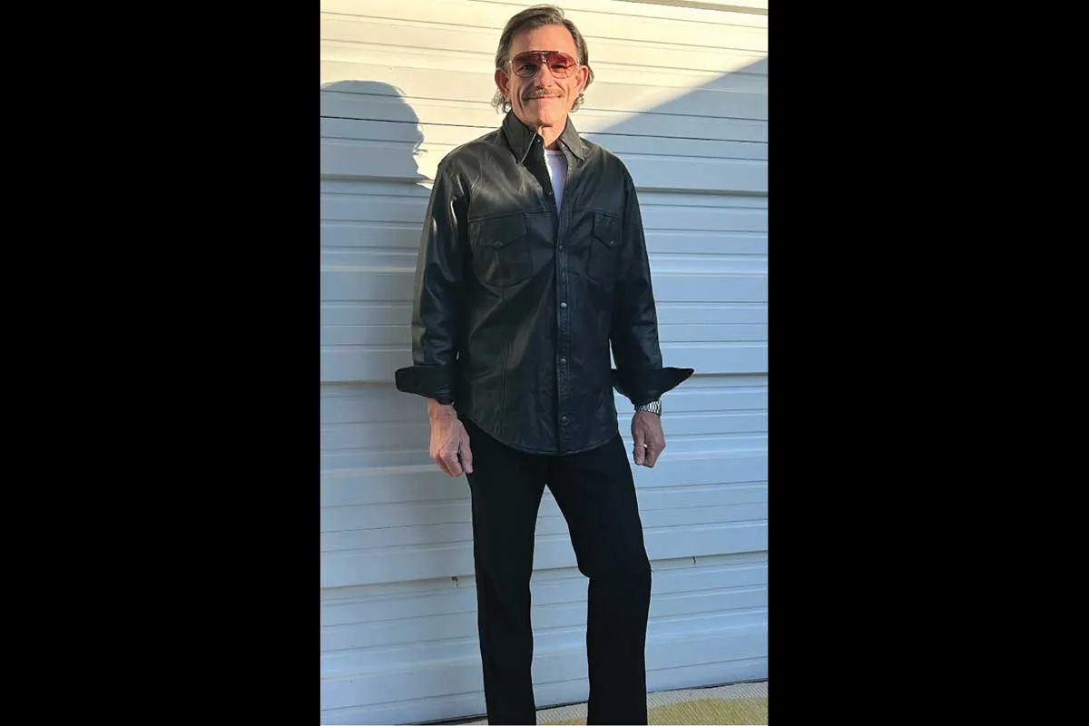 Mr. Ward wearing a black outfit.