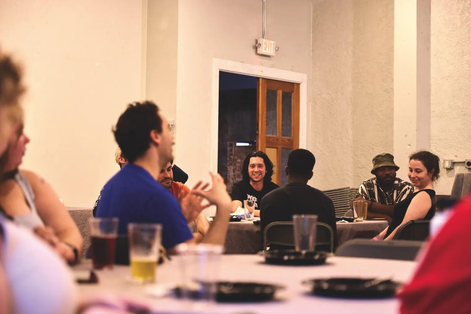 Members of the GAU-UF sit at tables and meet