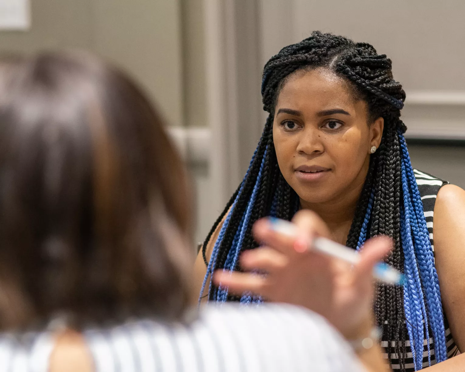Educator listens to a conversation