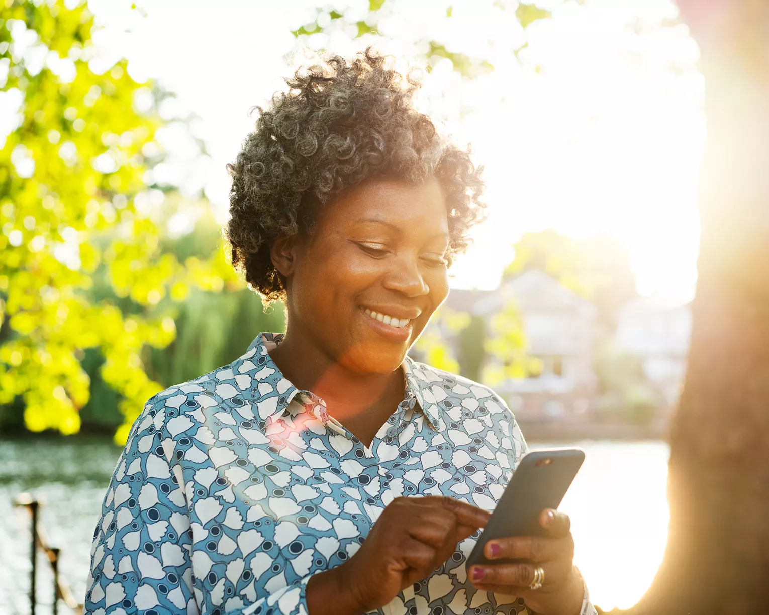 woman using her smart phone