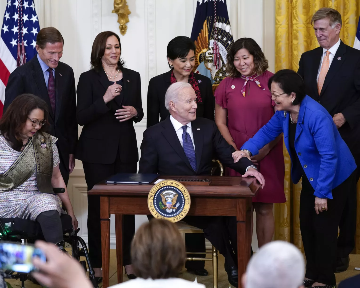 Joe Biden signes AAPI Hate Crimes Bill into law