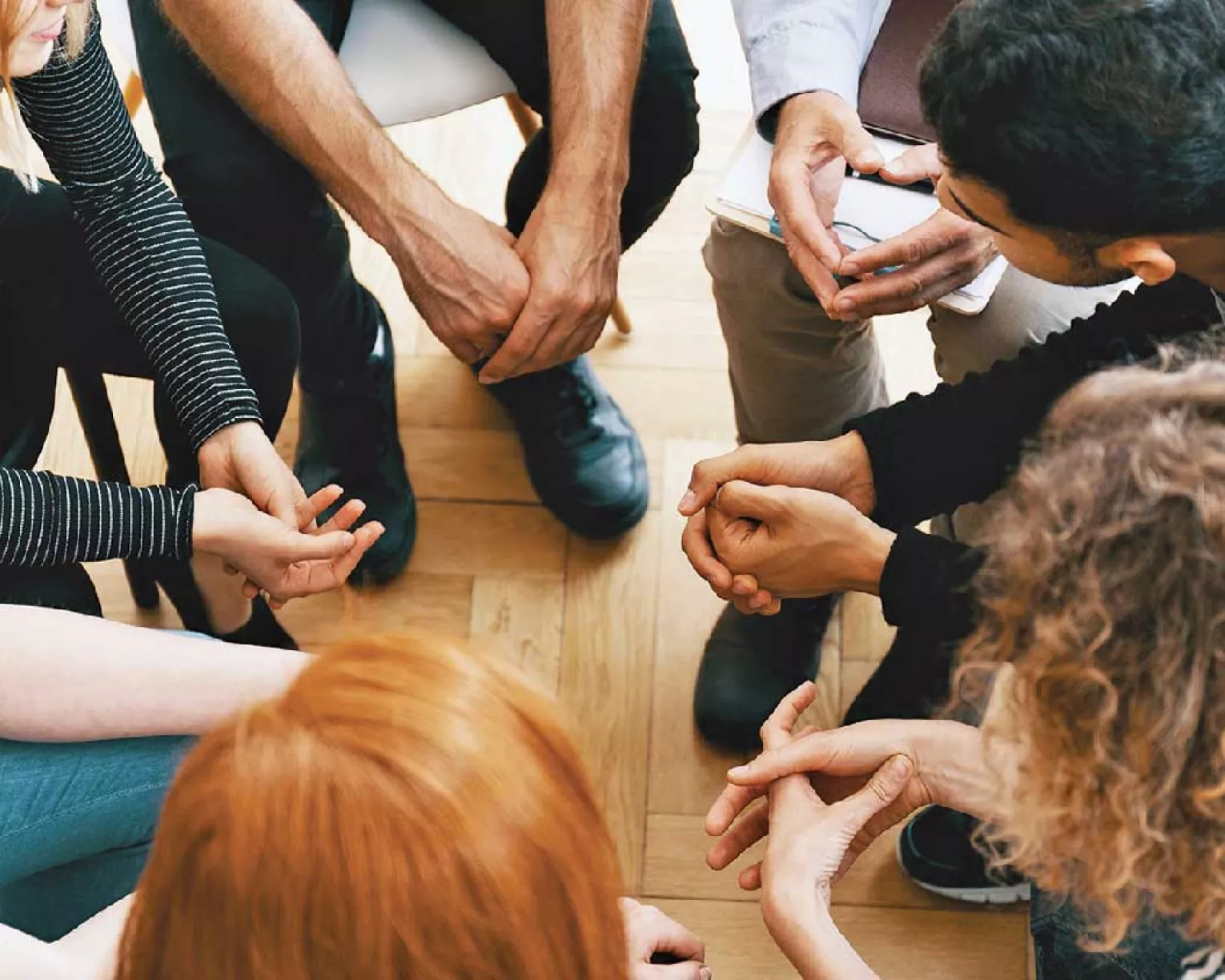 Students in a huddle.