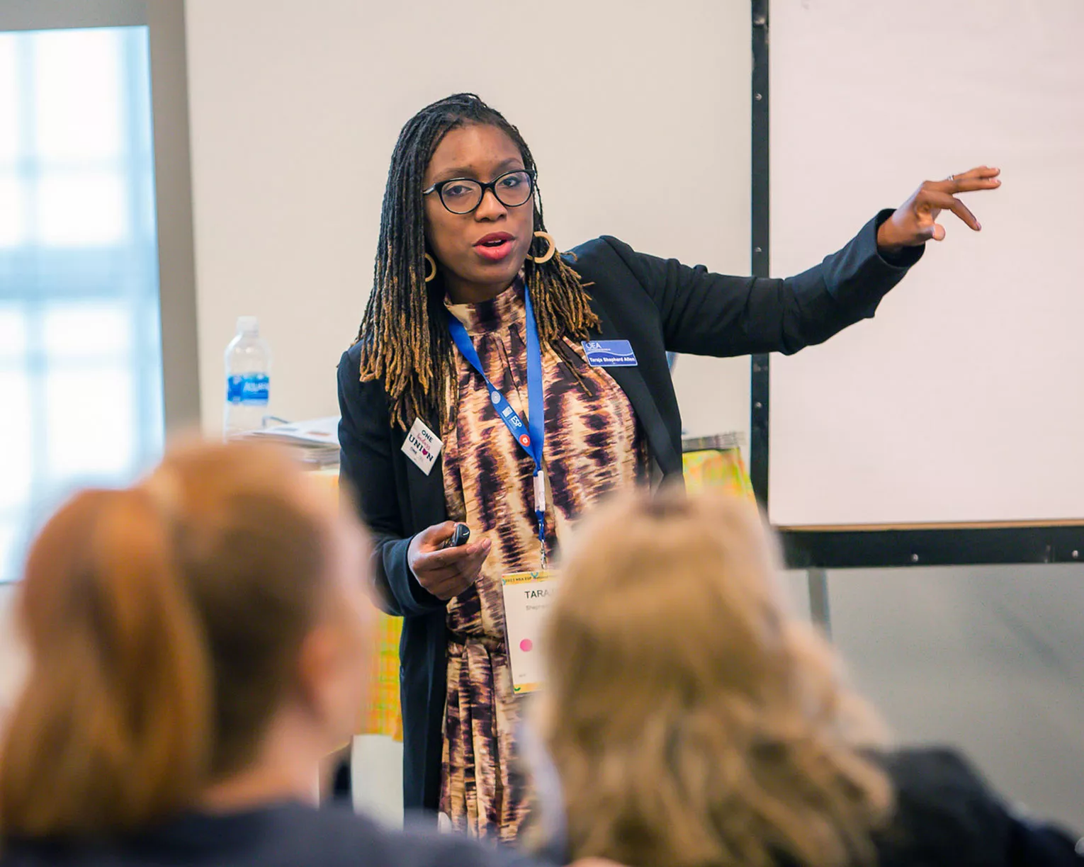 Black female presenter at educator conference