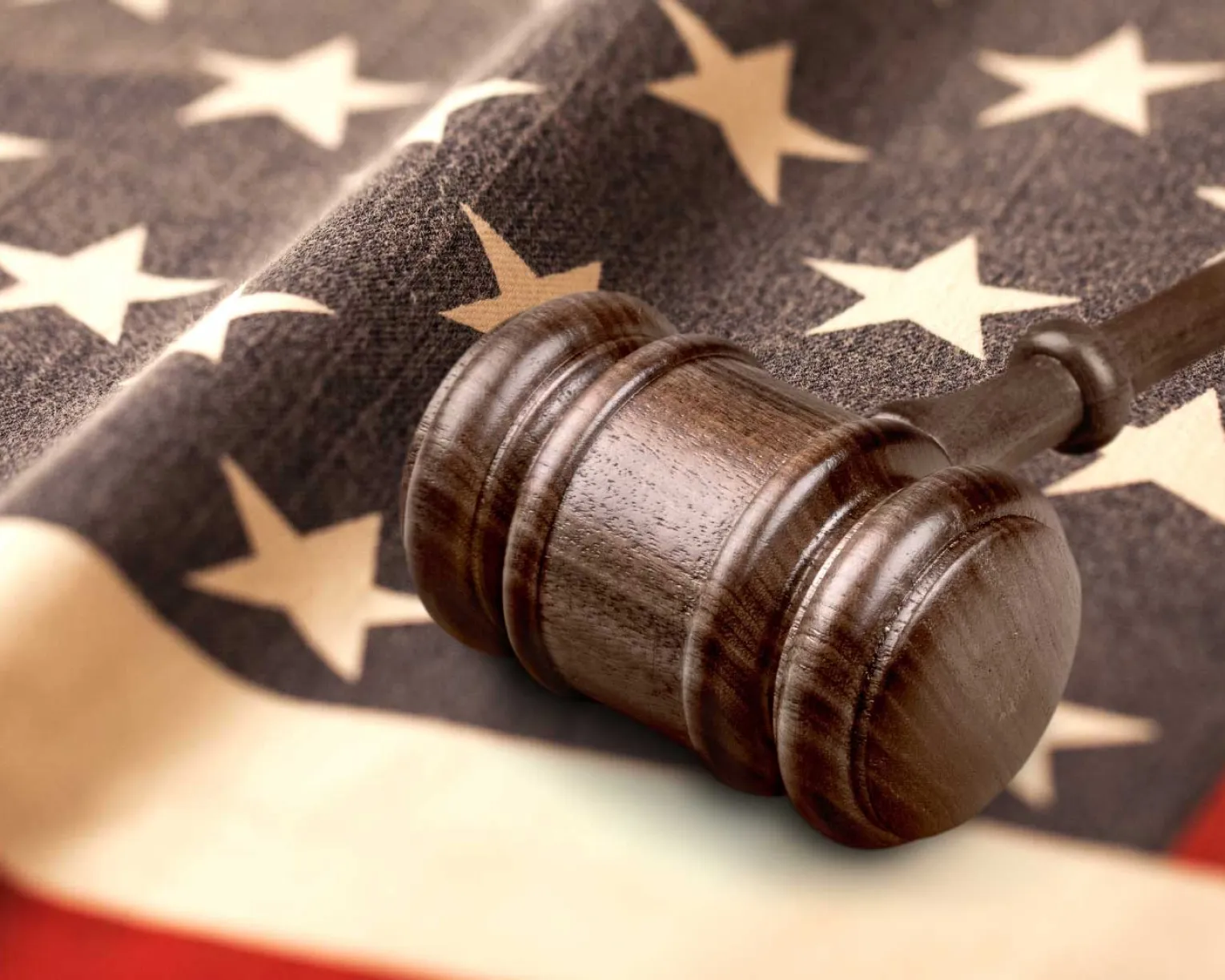 Gavel on top of the American flag.