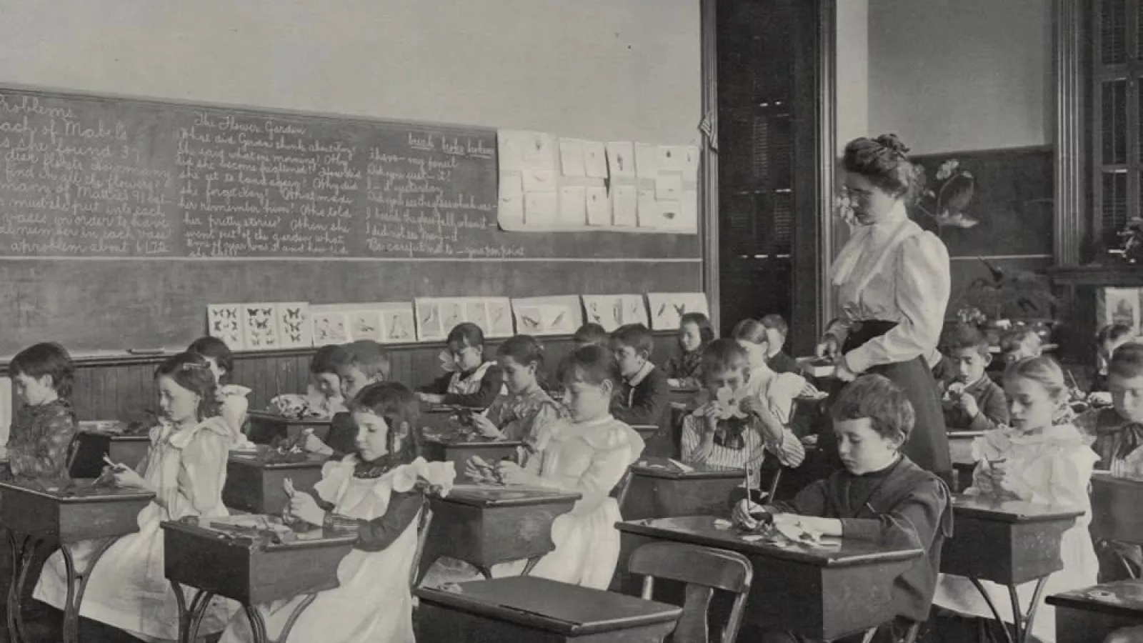 Famale teacher in 1800s classroom