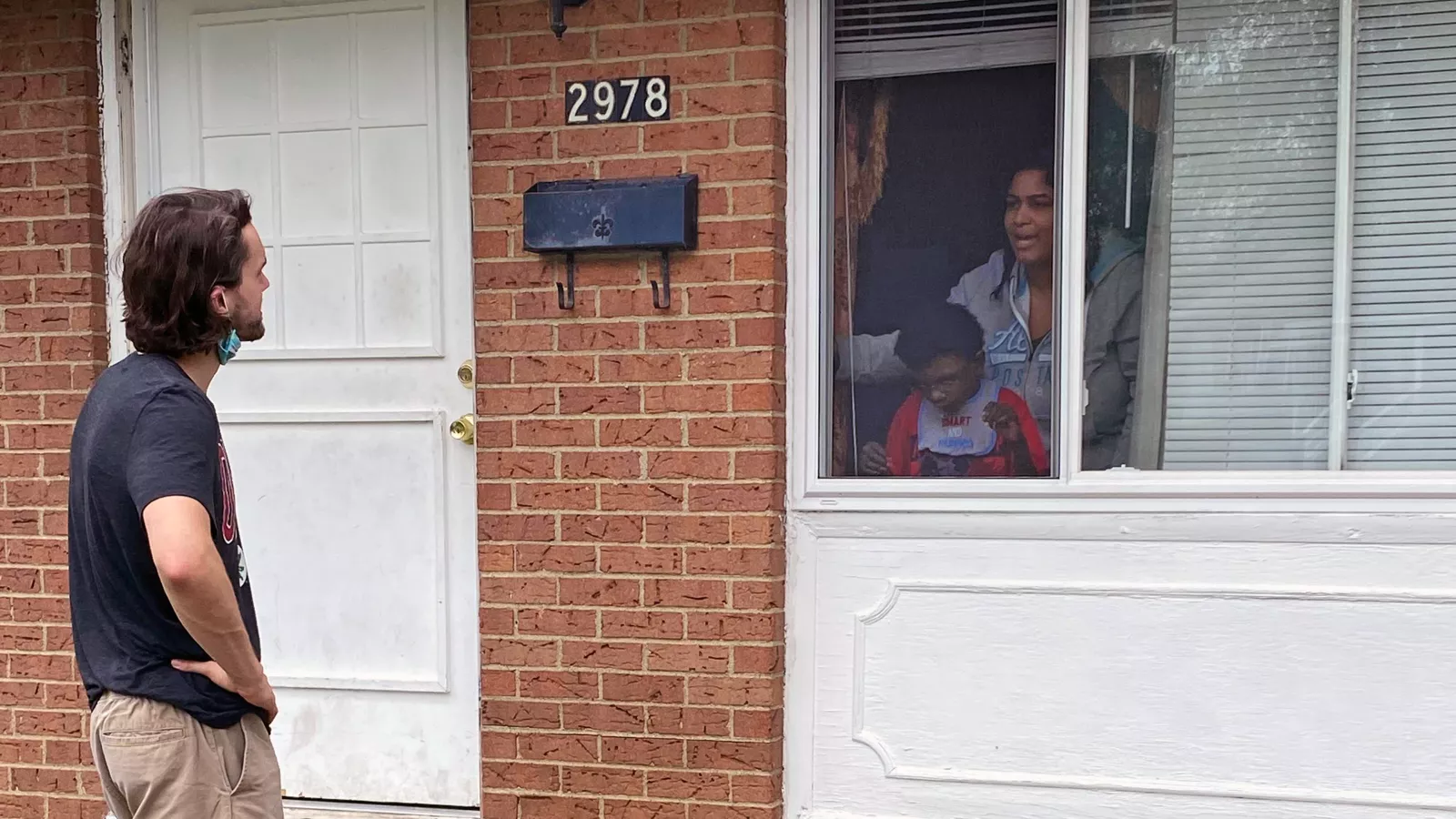 Special education teacher Chris Williams visits a student at home