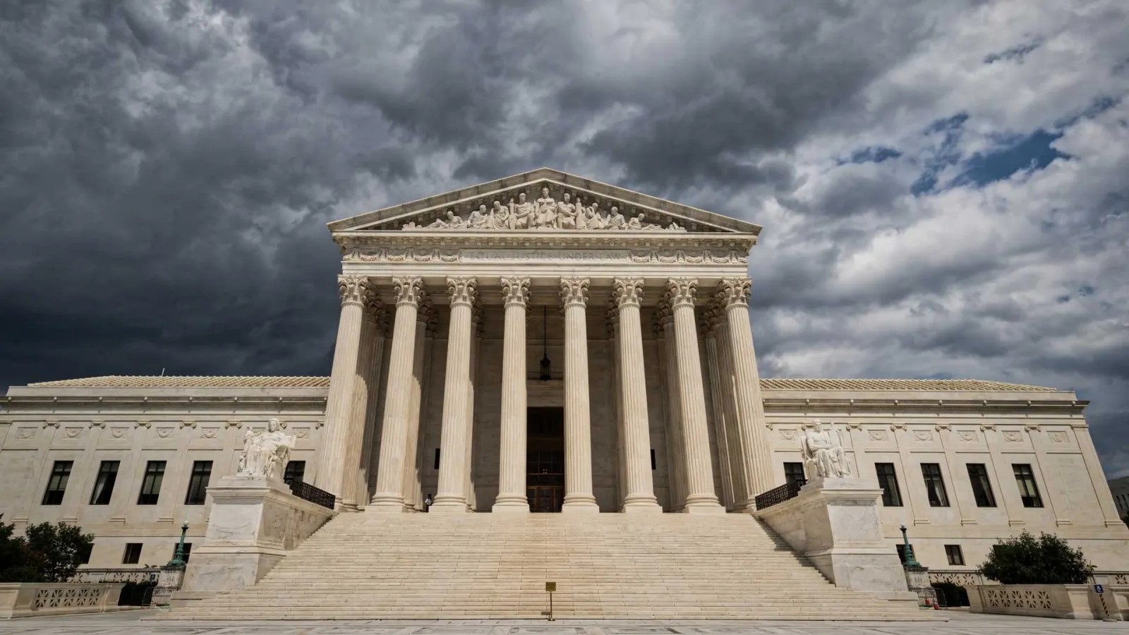 U.S. Supreme Court with ominous skies