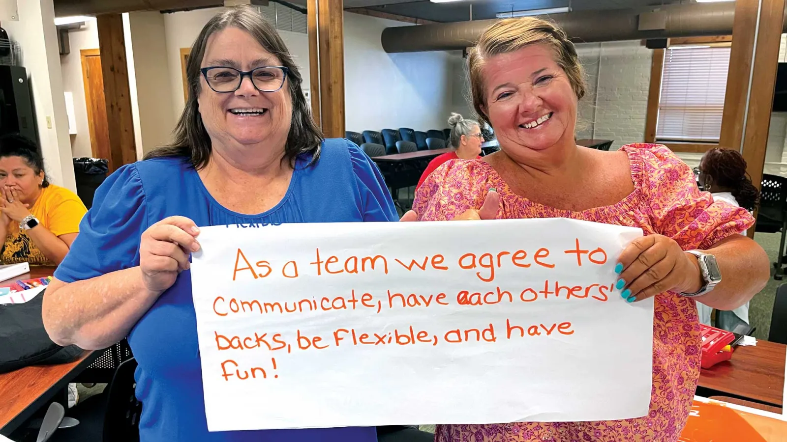 Teacher Nancy Tate (left) and paraeducator Lynne Formanski (right) drafted a team statement during a “Building Winning Teams” training in Hillsborough County, Florida.