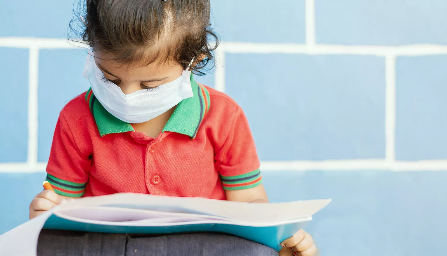 Elementary student wearing a face mask
