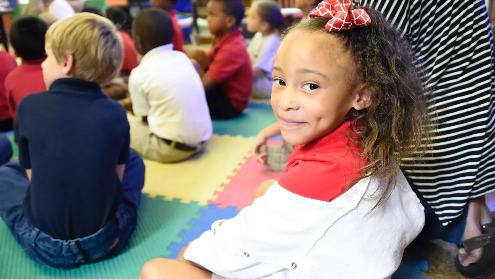 Young student smiles at the camera