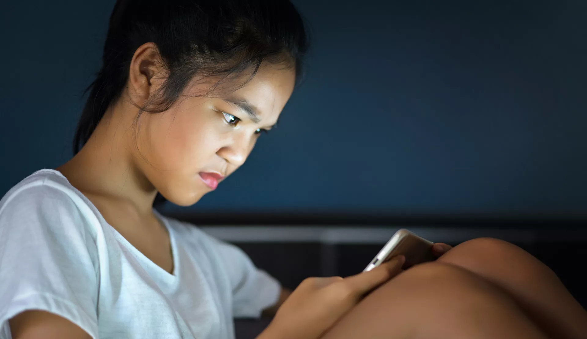 serious student on phone