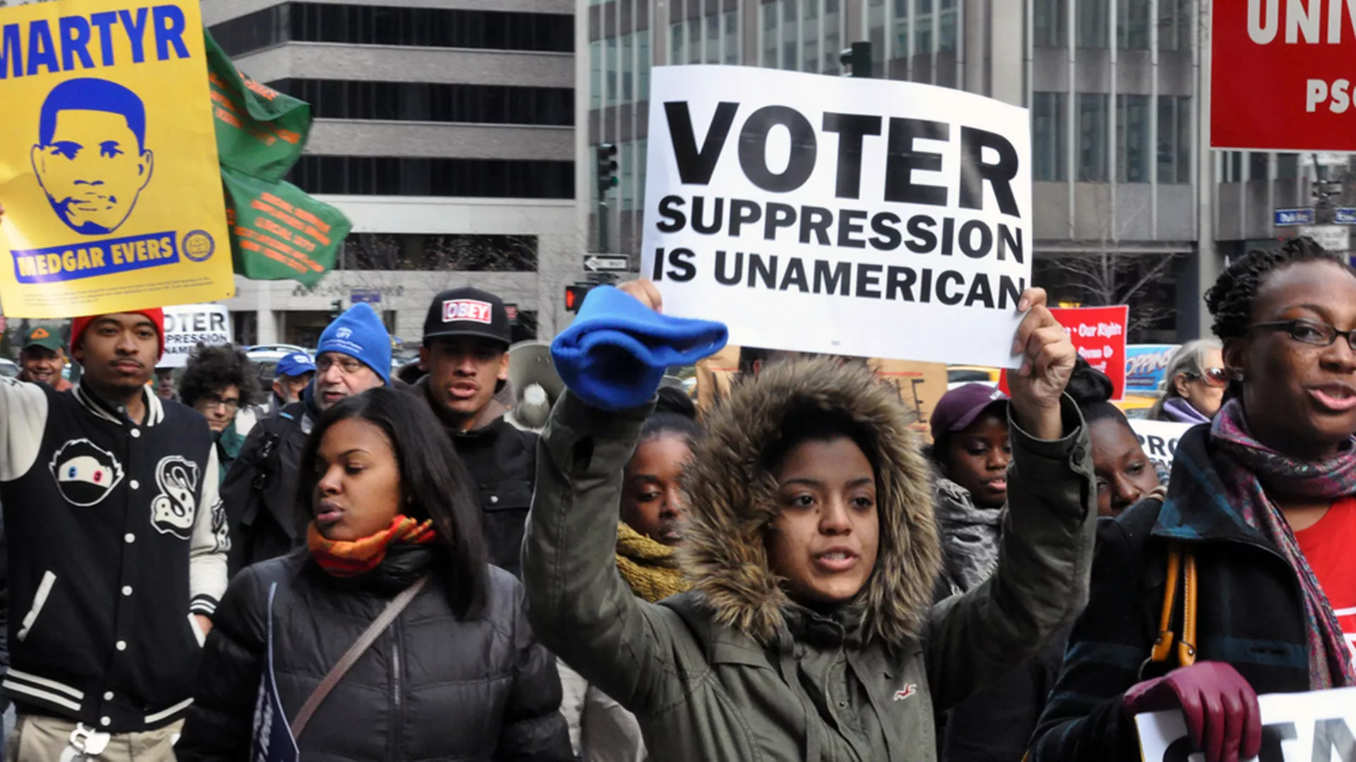 people protesting against voter suppression