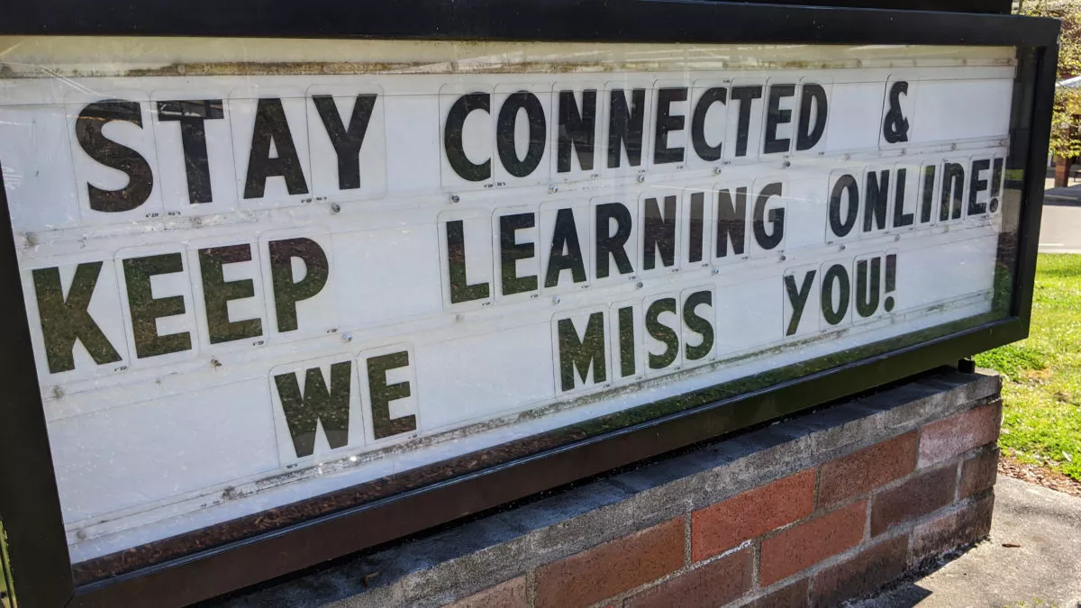 Sign encourages students to stay connected and keep learning