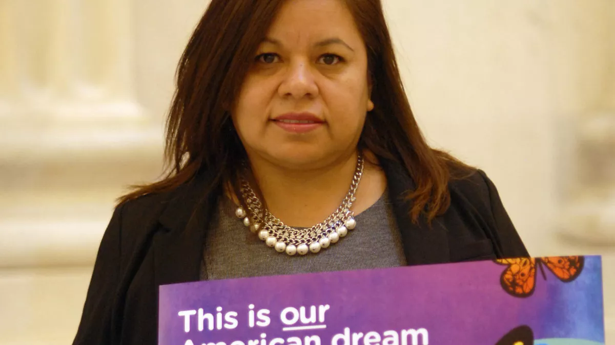 Dream Act supporter with sign