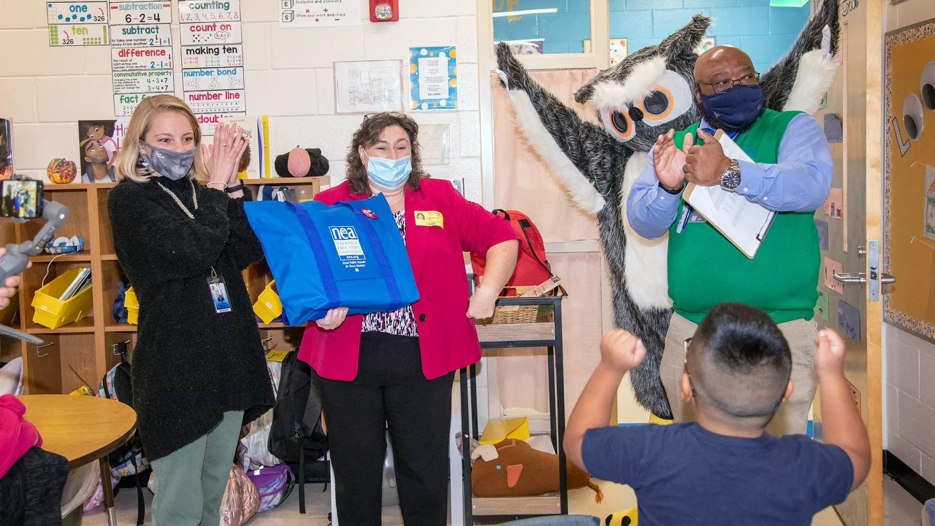 Catherine and friends deliver diverse books to her classroom!