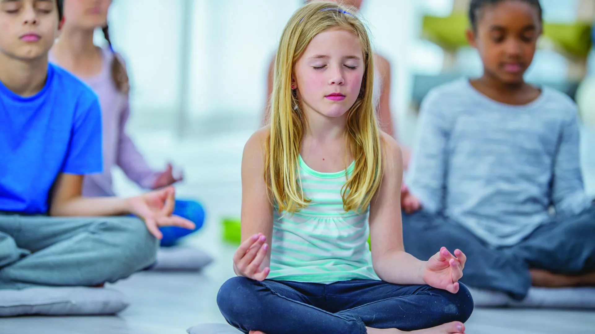 elementary students meditating during class