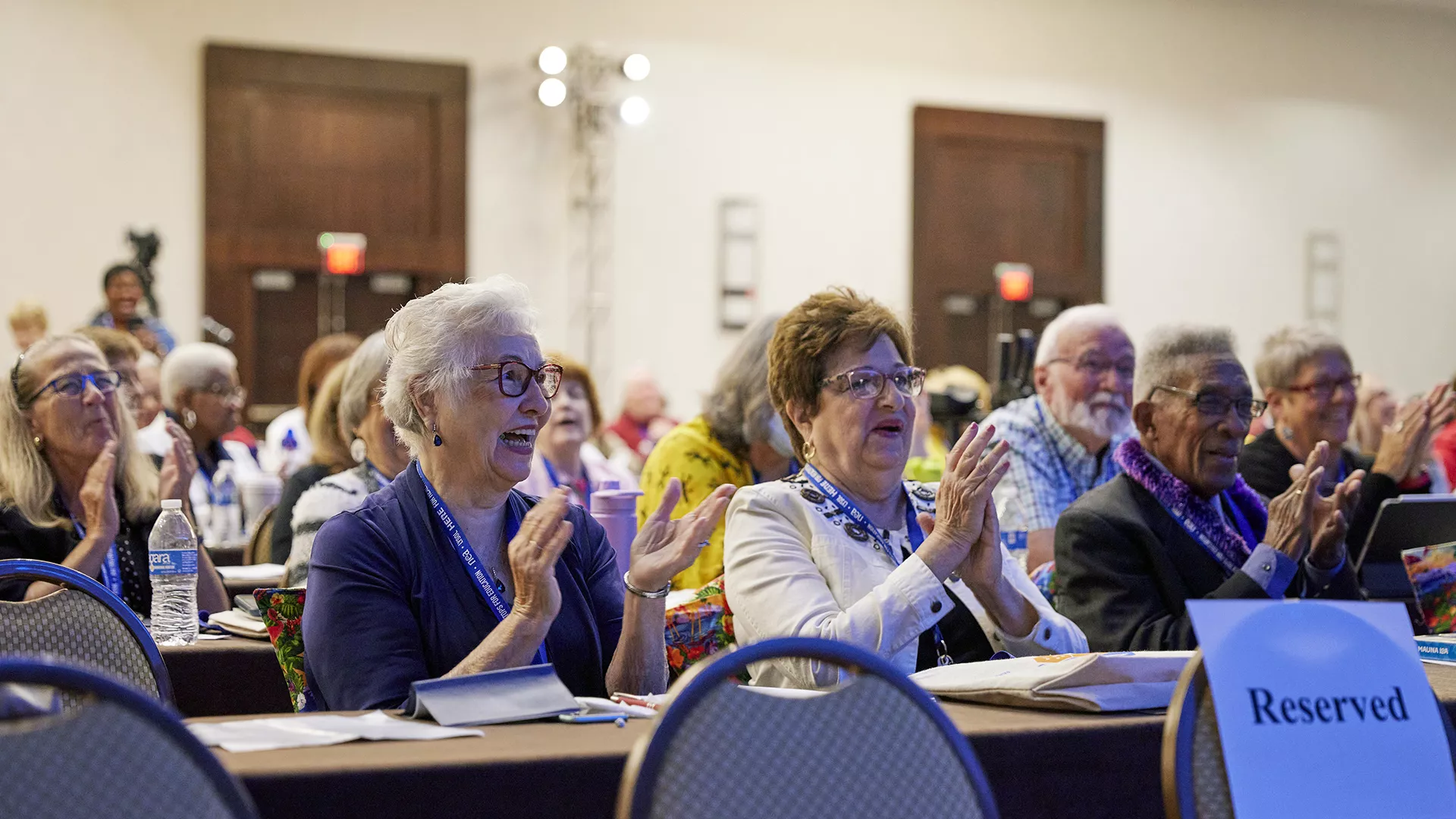 Attendees applaud a speaker at the 2023 NEA Retired Annual Meeting